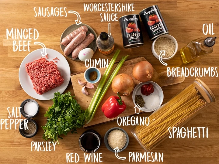Ingredients for Spaghetti and meatballs on a wooden table