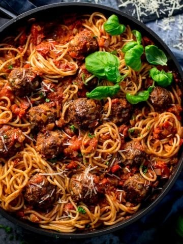 Square image of Spaghetti and meatballs in a pan