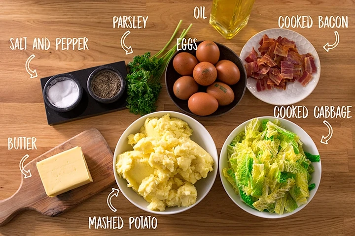 Ingredients for bubble and squeak on a wooden table