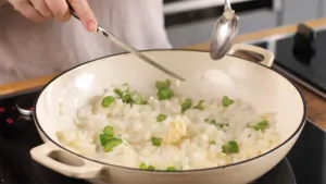 Onions and garlic cooking in a pan