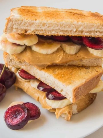 Peanut Butter, cherry and banana toastie - day two of my five day 'Sweet Toasties' series to brighten up your holiday breakfast.