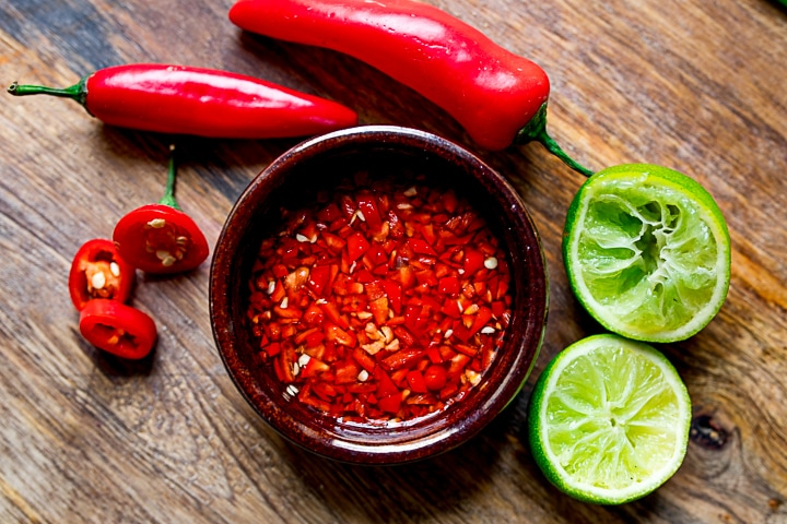 Red chilli dip in a brown bowl