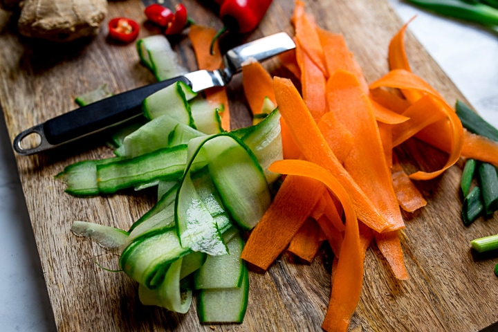 vegetable ribbons on a chopping board