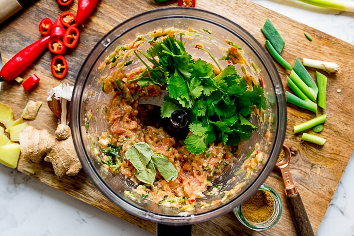 mixture for Thai fishcakes in a food processor with fresh coriander