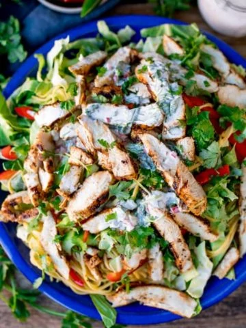 This Cajun Chicken Noodle Salad with Creamy Chilli Lime Dressing is a colourful any-season salad to set your taste buds tingling. Awesome Chicken Salad with a Kick! #Cajunchicken #noodlesalad #glutenfreesalad #glutenfreedinner #creamydressing