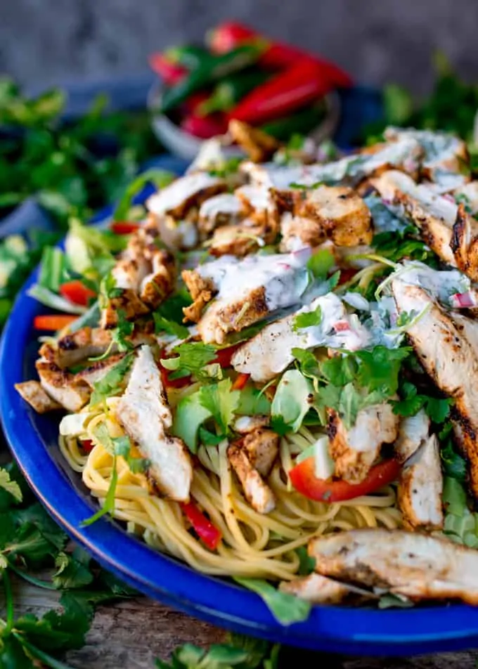 This Cajun Chicken Noodle Salad with Creamy Chilli Lime Dressing is a colourful any-season salad to set your taste buds tingling. Awesome Chicken Salad with a Kick! #Cajunchicken #noodlesalad #glutenfreesalad #glutenfreedinner #creamydressing