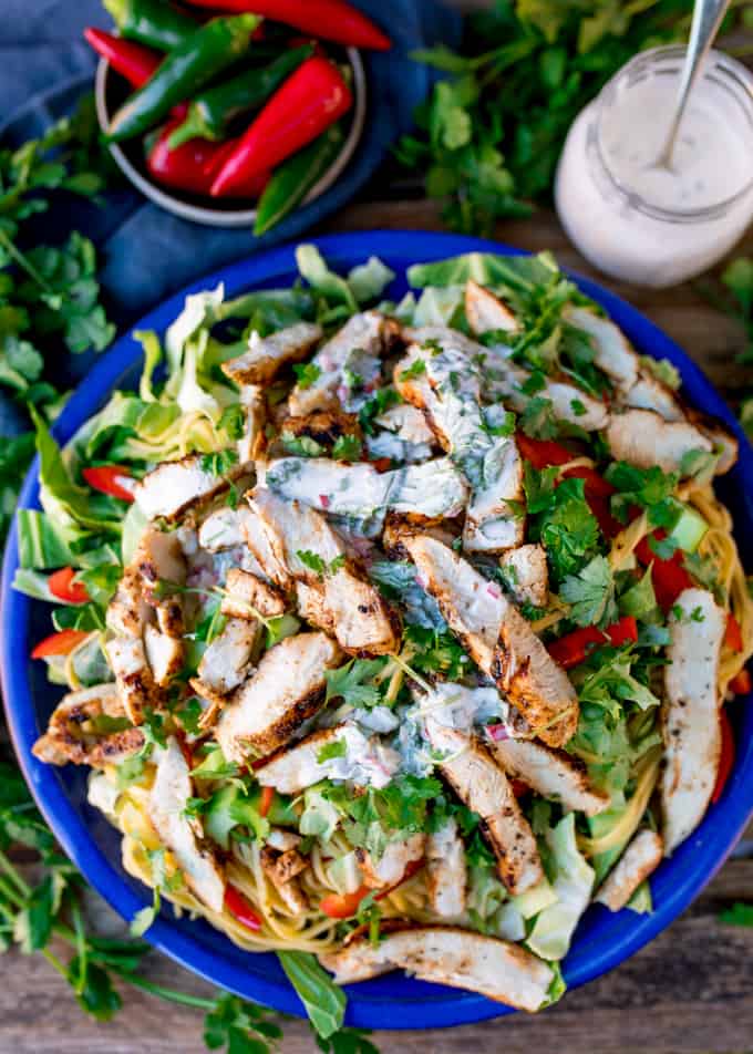 This Cajun Chicken Noodle Salad with Creamy Chilli Lime Dressing is a colourful any-season salad to set your taste buds tingling. Awesome Chicken Salad with a Kick! #Cajunchicken #noodlesalad #glutenfreesalad #glutenfreedinner #creamydressing