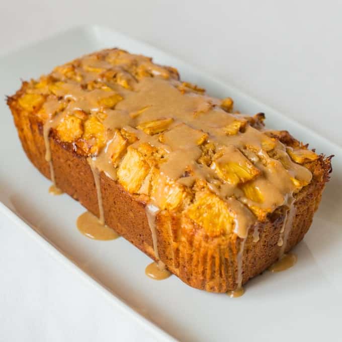 Coconut Pineapple Bread - Soft, tender coconut cake with caramelized pineapple and a brown sugar glaze.
