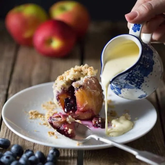 Stuffed Apples with Crumble Topping - Soft baked apples filled with blueberries and topped with a buttery crumble only 212 cals!