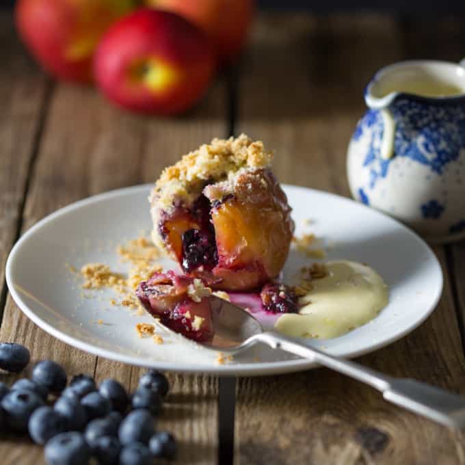 Stuffed Apples with Crumble Topping - Soft baked apples filled with blueberries and topped with a buttery crumble only 212 cals!