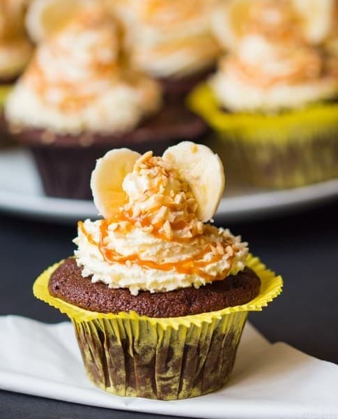 Chocolate Banana Sundae Cupcakes - with whipped cream, caramel drizzle and chopped hazelnuts. Who could resist!