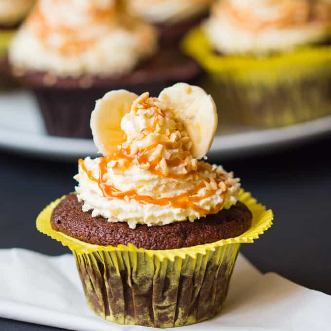 Chocolate Banana Sundae Cupcakes - with whipped cream, caramel drizzle and chopped hazelnuts. Who could resist!