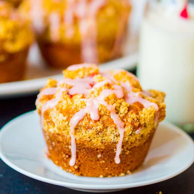 Strawberry Streusel cupcakes - Light, fluffy sponge with chunks of juicy strawberry, stopped with crunchy streusel and a sweet strawberry drizzle