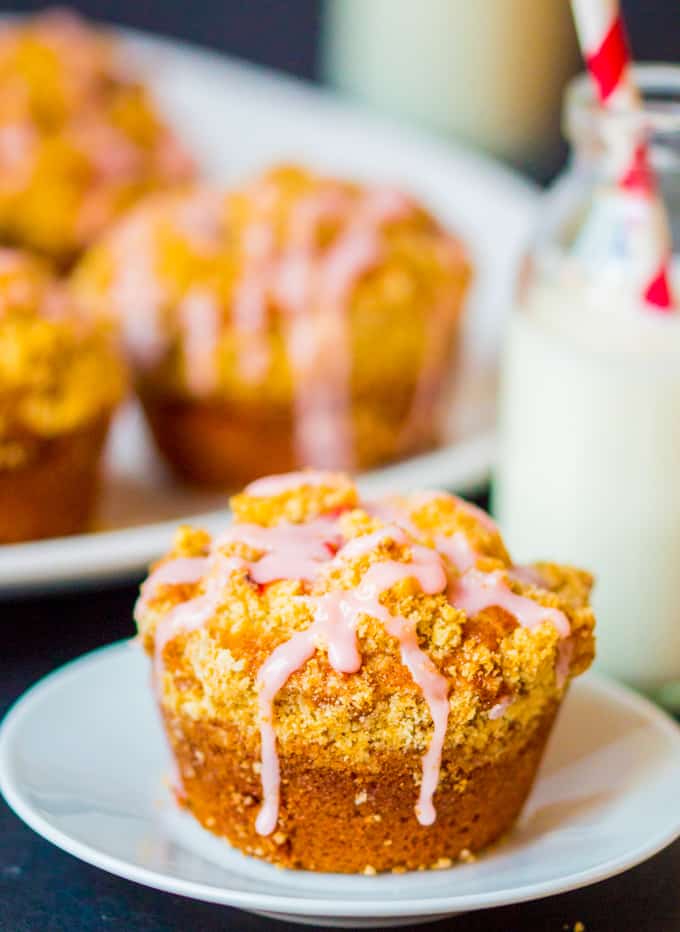 Strawberry Streusel cupcakes - Light, fluffy sponge with chunks of juicy strawberry, topped with crunchy streusel and a sweet strawberry drizzle