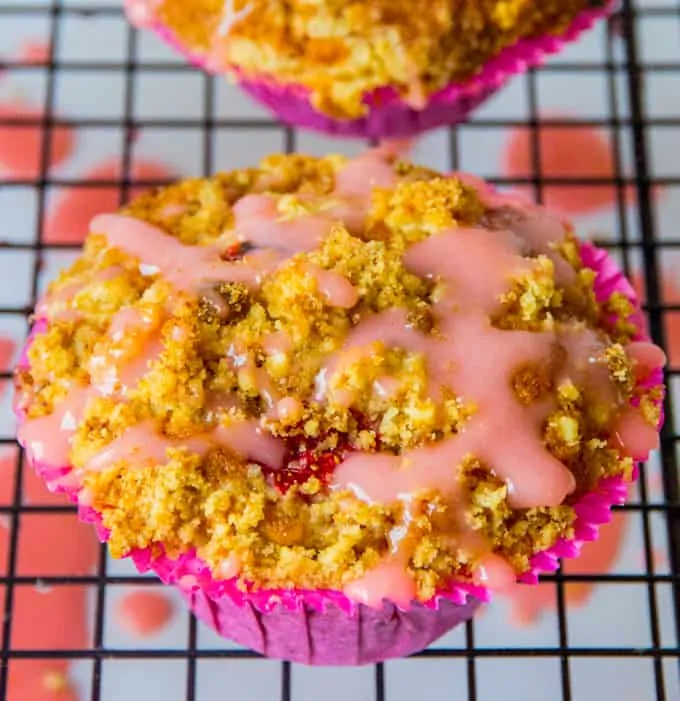 Strawberry Streusel cupcakes - Light, fluffy sponge with chunks of juicy strawberry, topped with crunchy streusel and a sweet strawberry drizzle