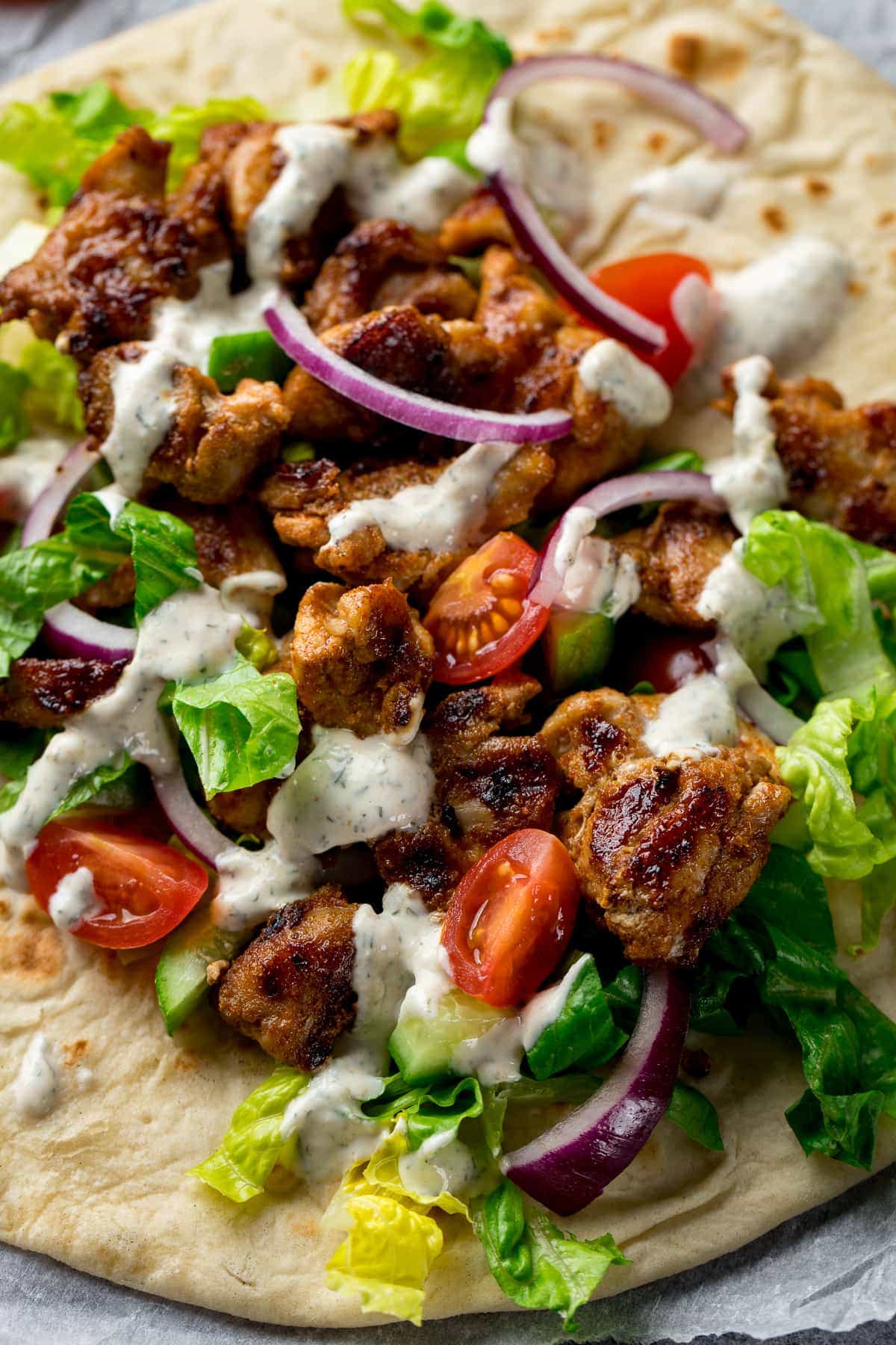 Close up of Chicken Shawarma on a pita bread