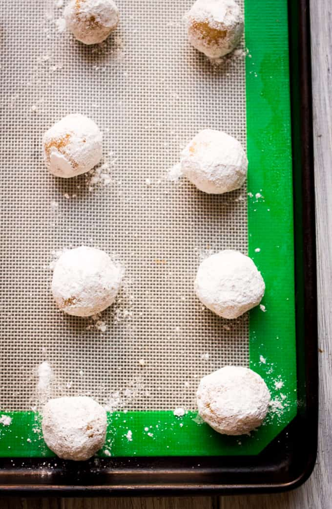 Amaretti cookies on a baking tray.