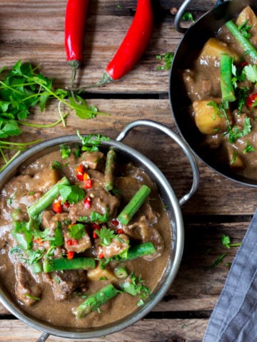 Slow Cooked Lamb Massaman Curry - tender lamb and potatoes with coconut milk and an easy homemade massaman sauce.