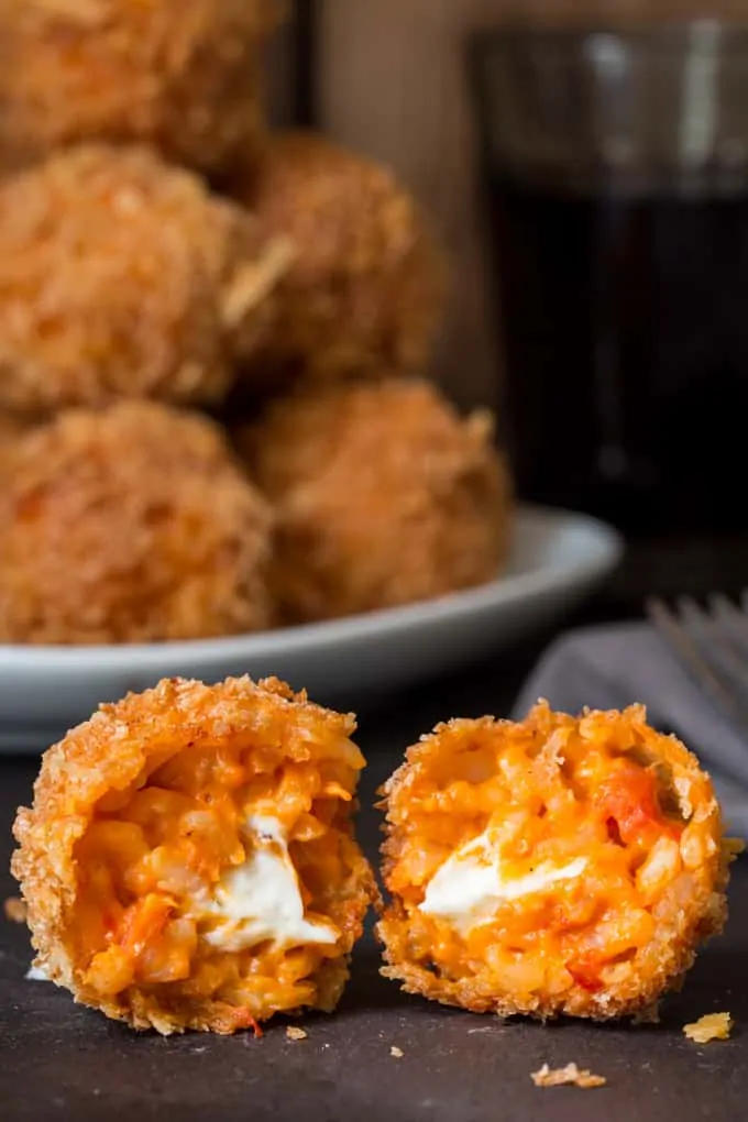 Creamy Tomato Risotto Balls, filled with creamy boursin cheese, coated in breadcrumbs and fried until golden and crisp.