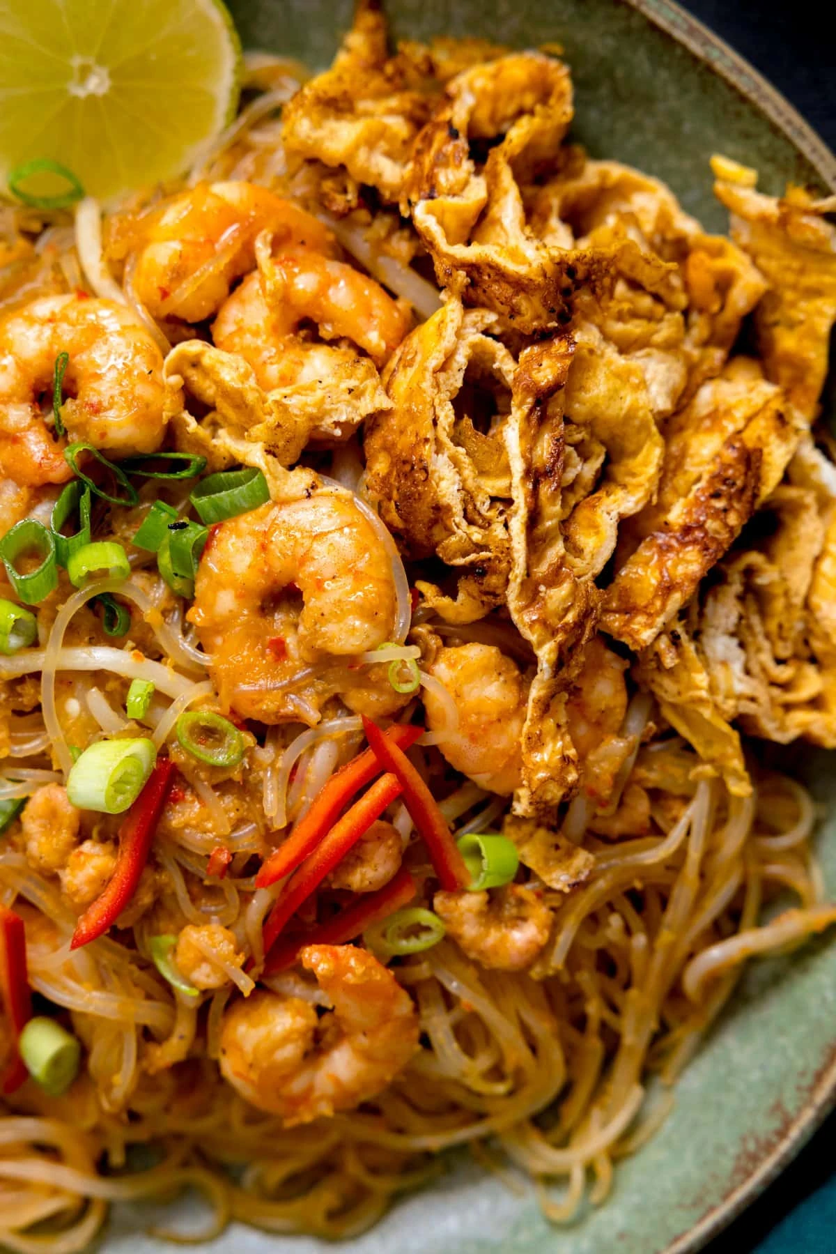 Close up overhead shot of Mee Siam fried noodles with prawns.