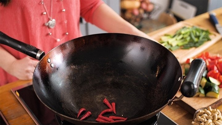 Dry frying chillies for kung pao chicken