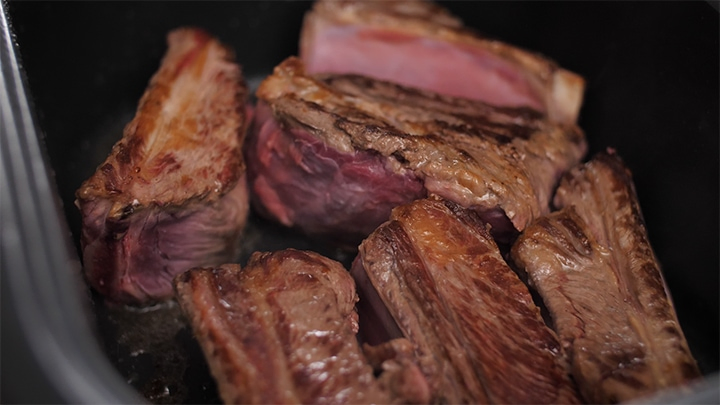 Browned short ribs in a slow cooker