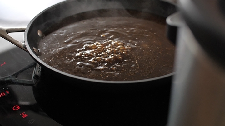 Gravy simmering in a pan