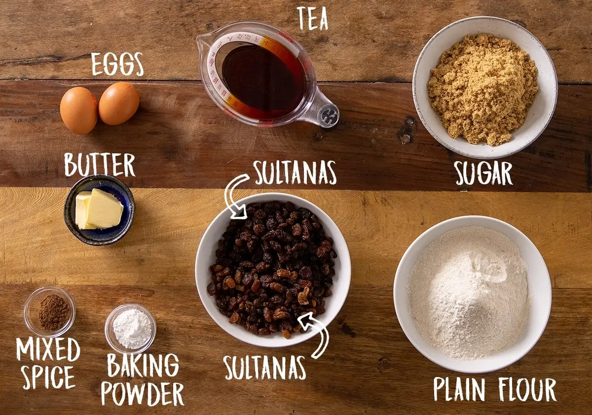 Ingredients for fruit tea load on a wooden table