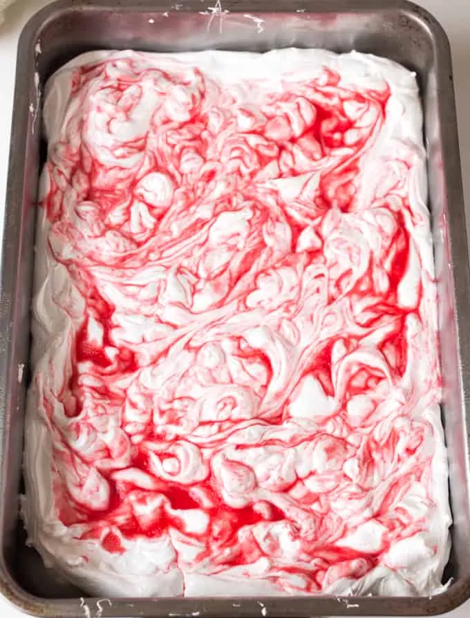 Light, fluffy vanilla marshmallows, swirled with homemade rhubarb paste.