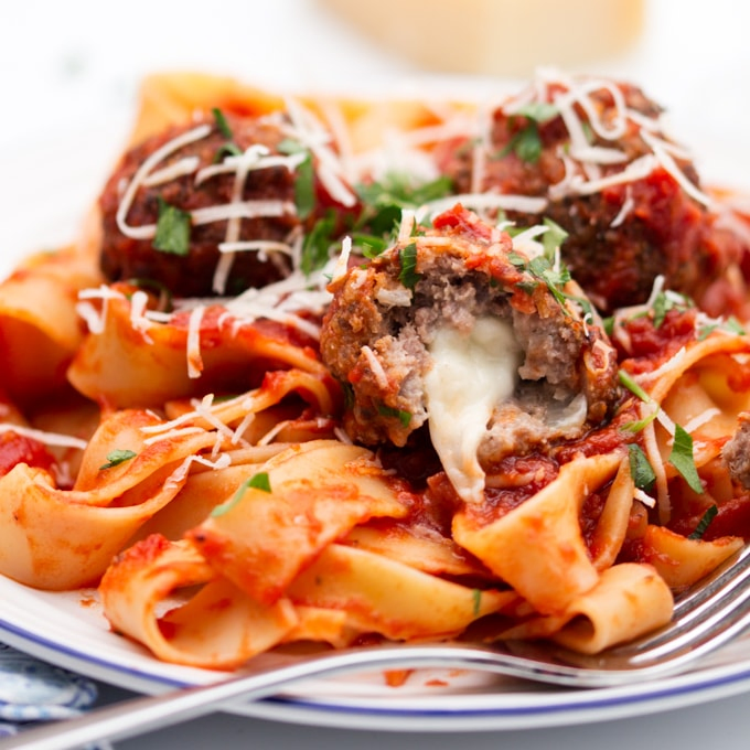 Tender meatballs stuffed with oozy mozzarella, served in a rich tomato sauce with pappardelle. Loved by kids and adults alike!