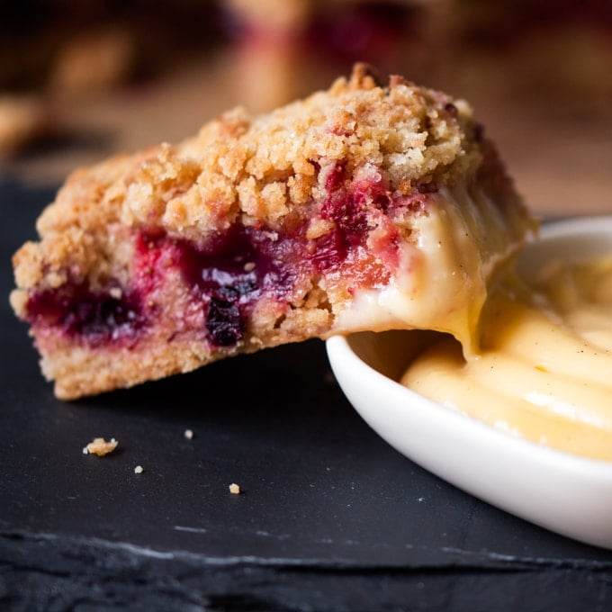 Crunchy biscuit base, juicy berry centre and buttery crumble topping served with a creamy, white chocolate custard dip. One bar is just not enough.