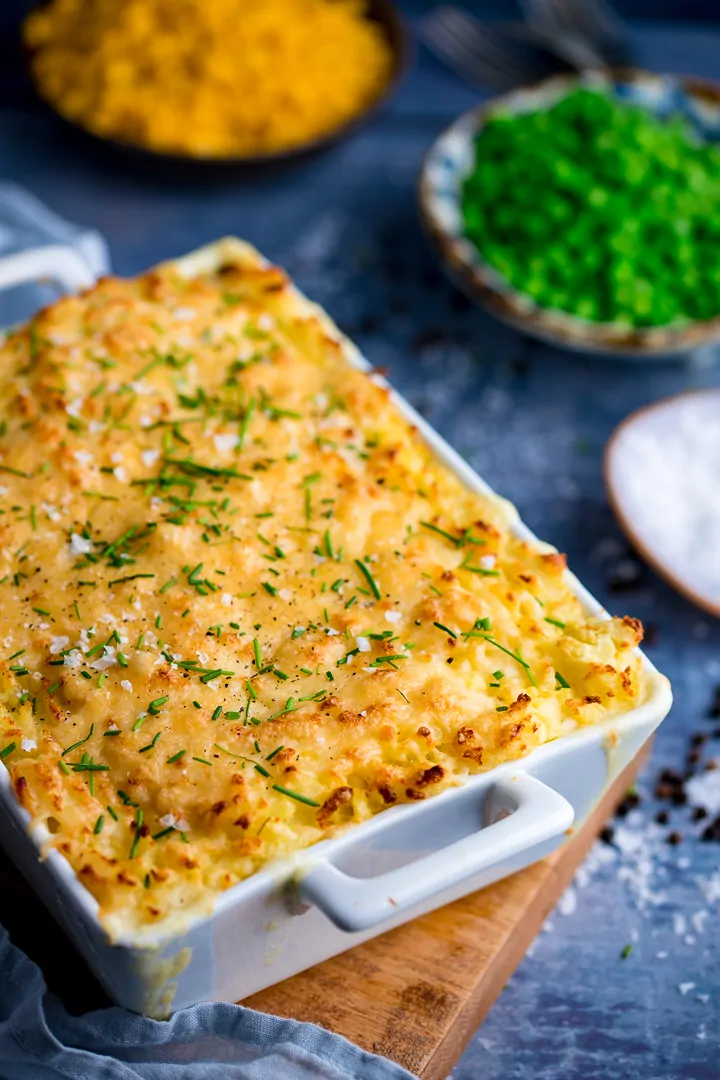 Fish pie with mashed potato in a white rectangular dish