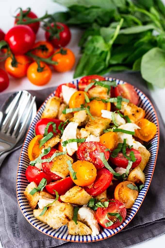 Panzanella Caprese salad. The dressing-soaked garlic croutons are what makes this salad so amazing!