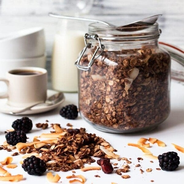 Chocolate coconut granola with cranberries - my kids love this because it turns the milk chocolatey!