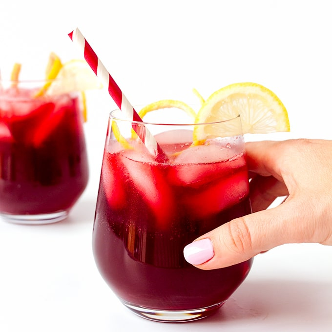 Spiced Berry Cooler - A punchy and refreshing non-alcoholic cocktail. Serve over ice for the perfect summer BBQ drink.