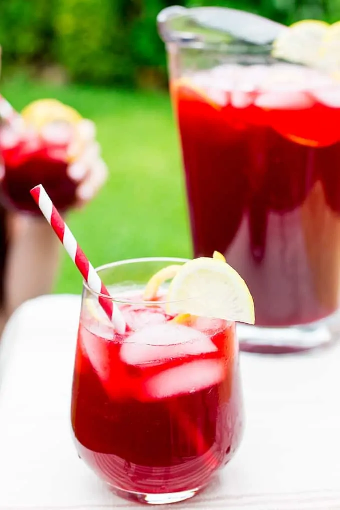 Spiced Berry Cooler - A punchy and refreshing non-alcoholic cocktail. Serve over ice for the perfect summer BBQ drink.