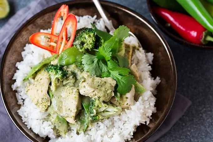 Bowl with rice and Thai Green Curry with sliced chillis