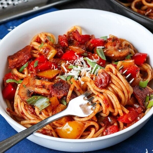 You can make this flavour-packed spaghetti dish ahead of time - without it clumping together. Full of veg, plus crispy bacon. Just reheat for a quick dinner. Freezable too!