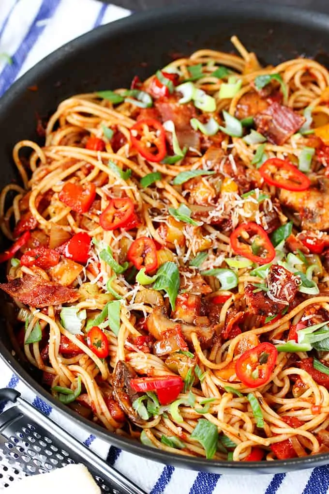 You can make this flavour-packed spaghetti dish ahead of time - without it clumping together. Full of veg, plus crispy bacon. Just reheat for a quick dinner. Freezable too!