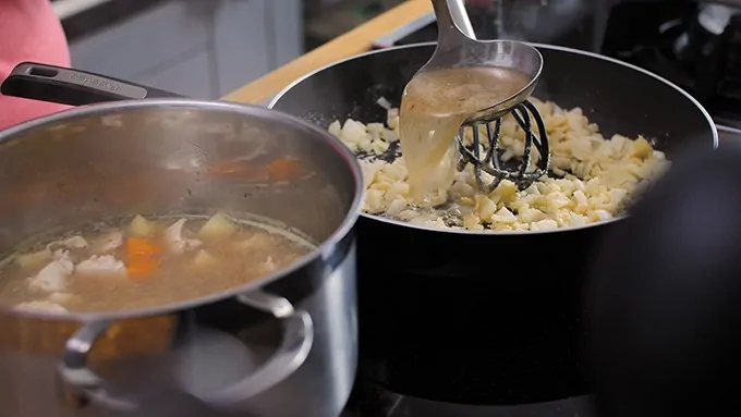 Making creamy sauce for chicken pie filling