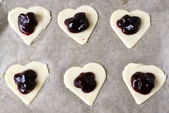 Valentine's Day Cherry Pies. Simple sugar-sprinkled cherry hand pies - a simple but thoughtful gift for your Valentine.