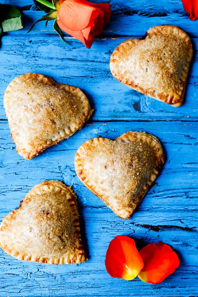 Valentine's Day Cherry Pies on a blue board