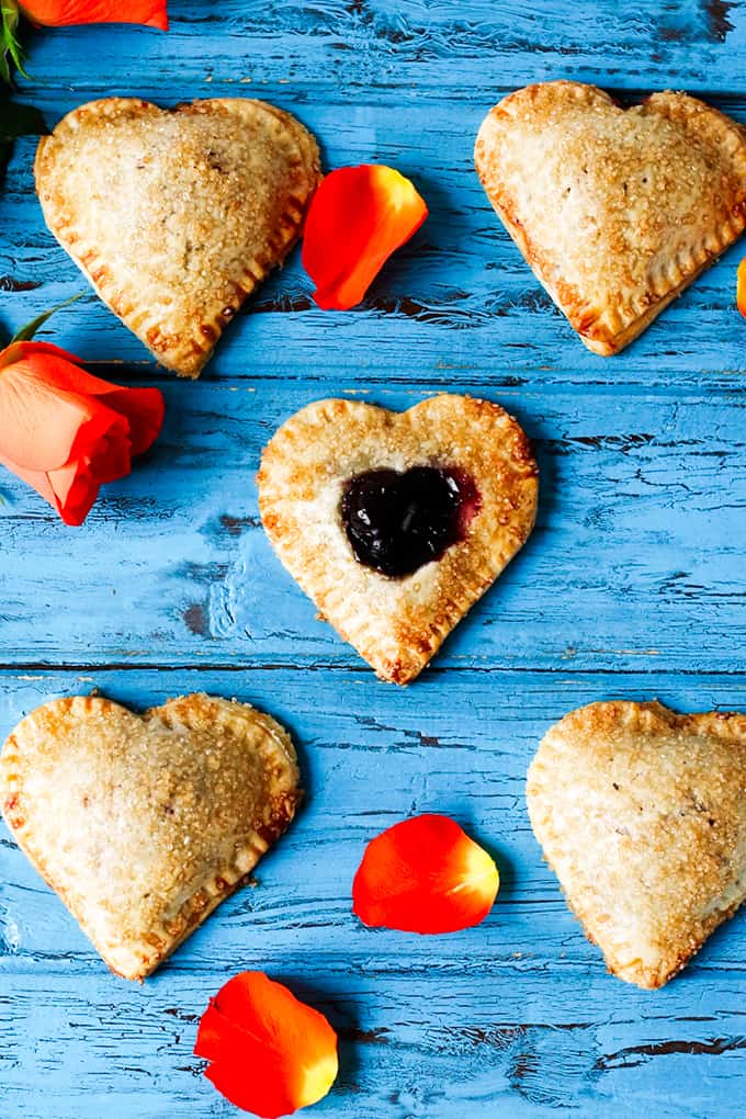 Valentine's Day Cherry Pies. Simple sugar-sprinkled cherry hand pies - a simple but thoughtful gift for your Valentine.