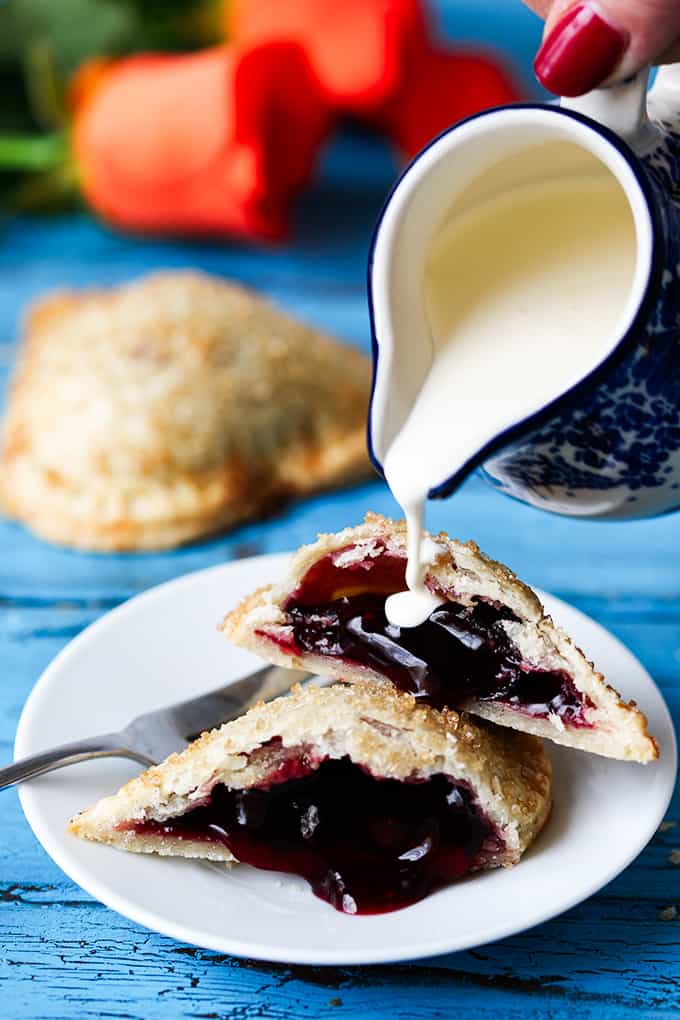 Valentine's Day Cherry Pies. Simple sugar-sprinkled cherry hand pies - a simple but thoughtful gift for your Valentine.