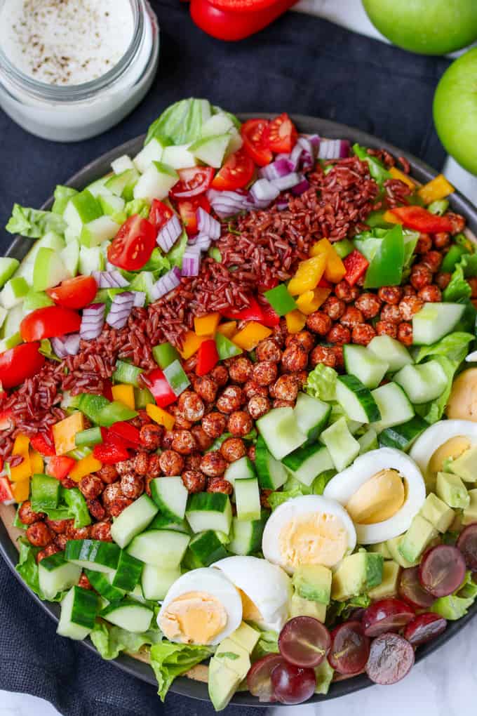A colourful chopped cob salad with smoky chickpeas and goat's cheese dressing!