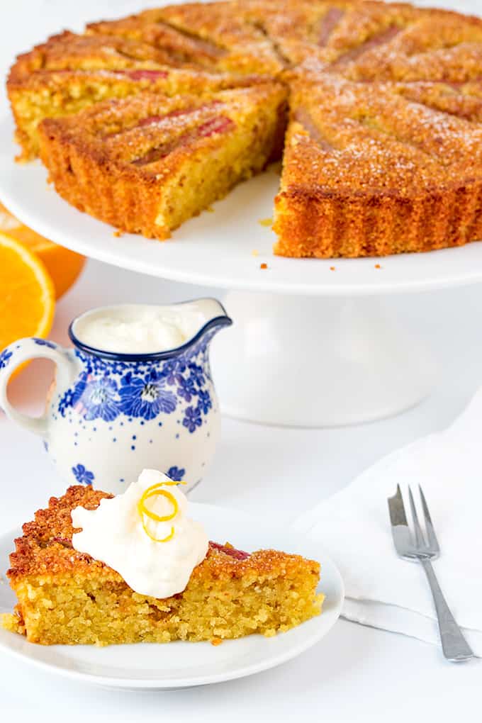 Rhubarb and Amaretti Cake, A moist, orange-infused almond cake with juicy rhubarb and amaretto cream.