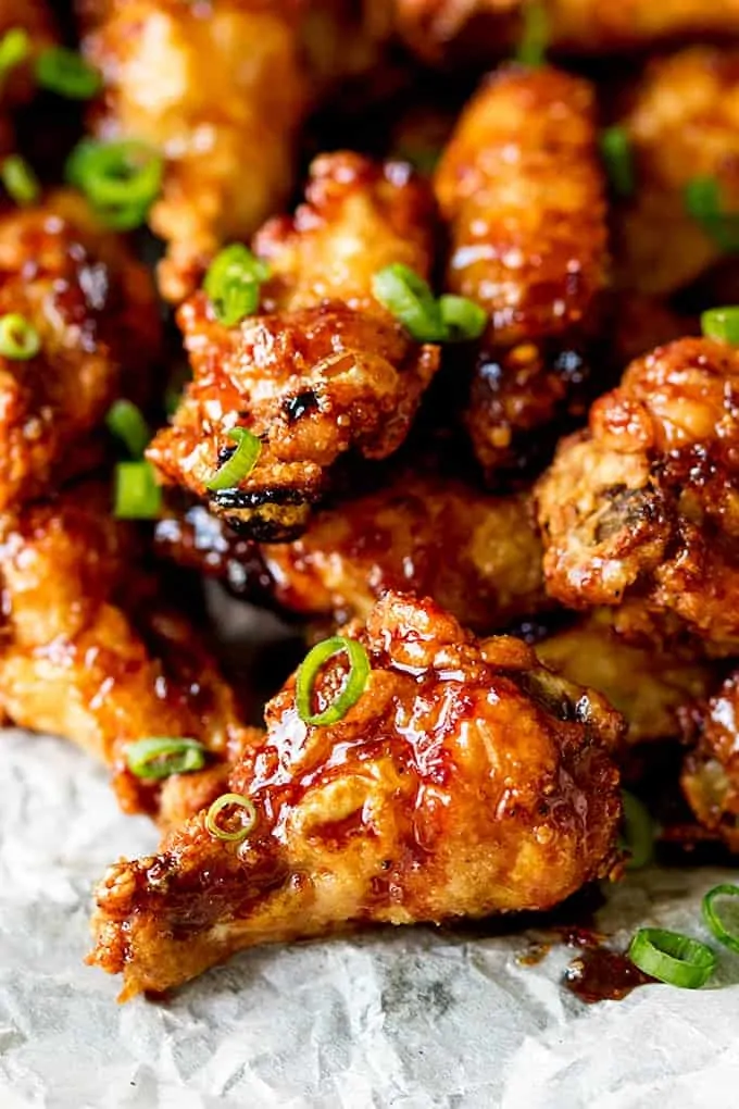 https://www.kitchensanctuary.com/wp-content/uploads/2016/06/Crispy-Chicken-Wings-with-Sticky-Asian-Glaze-tall-FS.webp