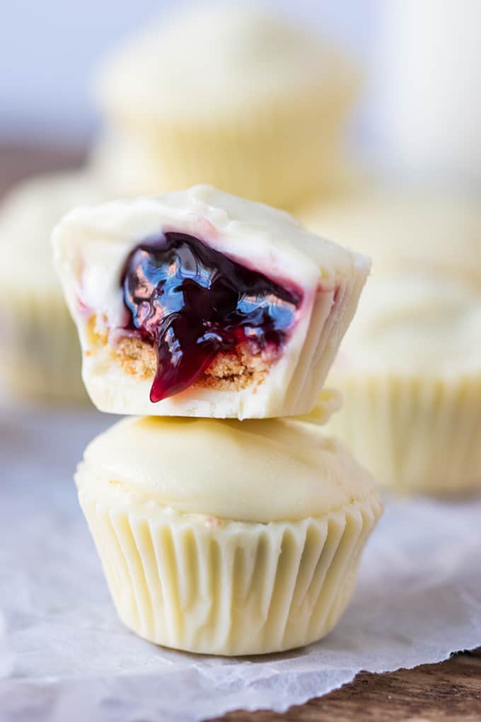 Bite sized creamy white chocolate cups filled with crushed biscuit and cherries - a simple 3-ingredient treat!