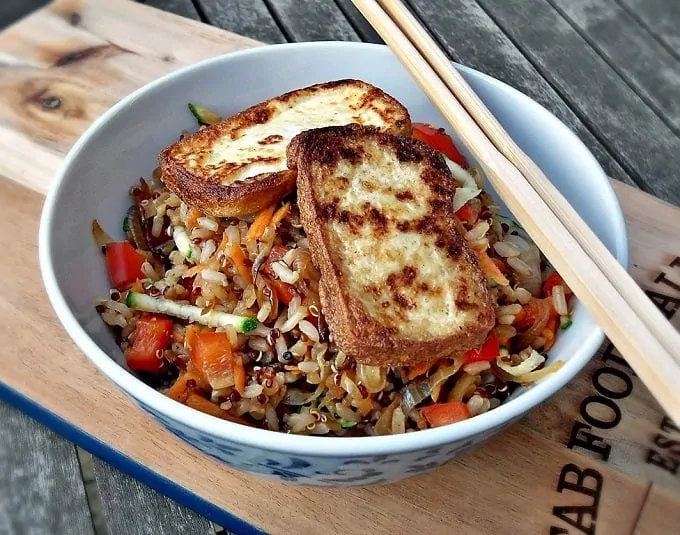 warm rice and quinoa salad with pan fried tofu