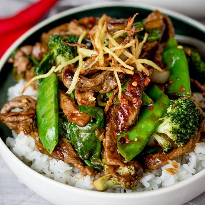 Spicy Ginger Beef stir fry - tender beef sirloin with crispy ginger, green veg and a simple-but-tasty Chinese-inspired sauce.